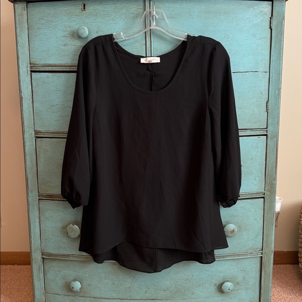 Sugarlips Black Woman’s Blouse.